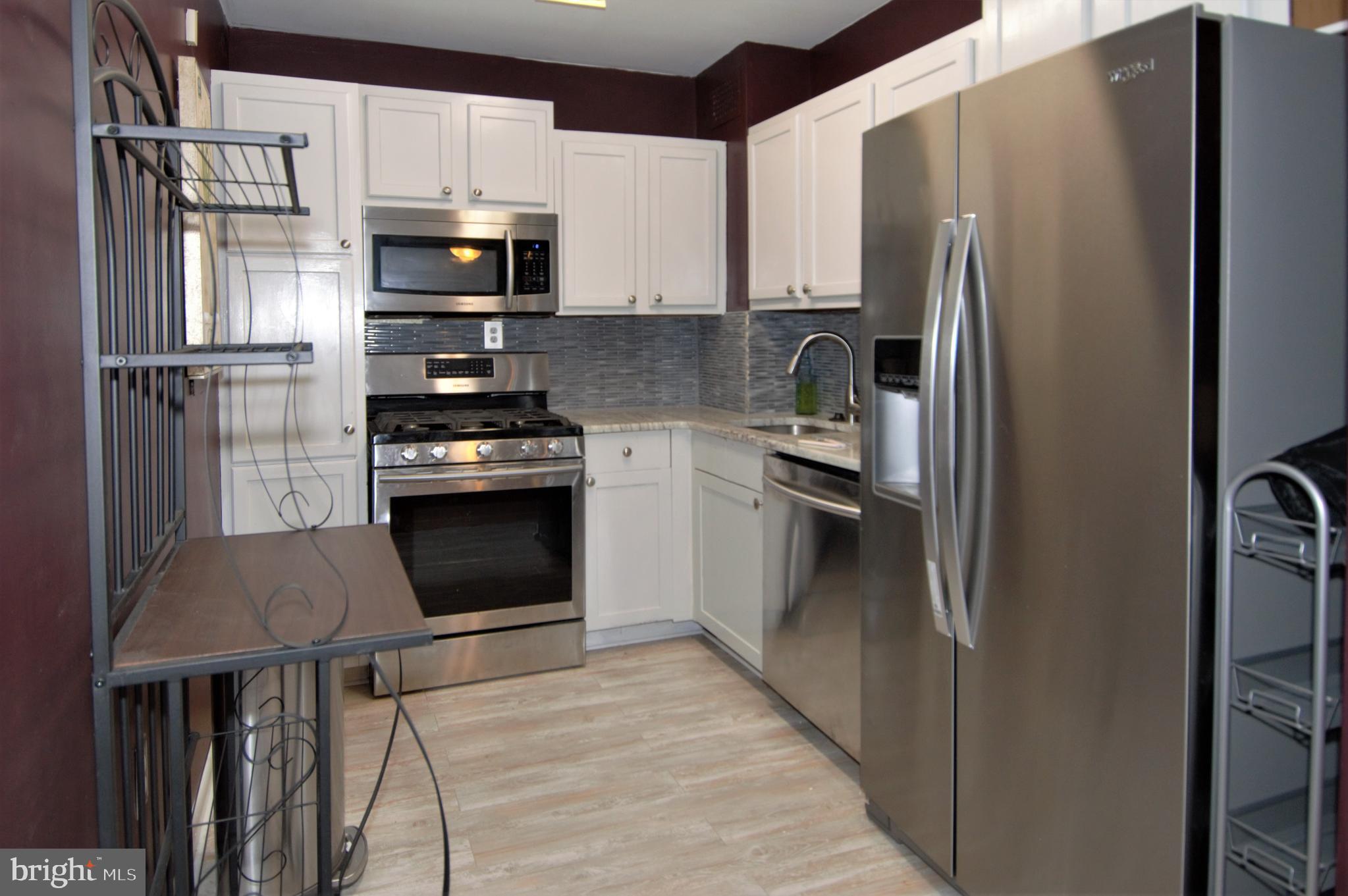 This Updated 1 Bedroom, 1 Bath Condo has Granite Counter Tops, new Pergo-Like Flooring Throughout, New er Windows, Newer Appliances, Updated Bathroom and Freshly Painted! Nothing to do but move your furniture! Laundry just down the hall! Security at the front door,
