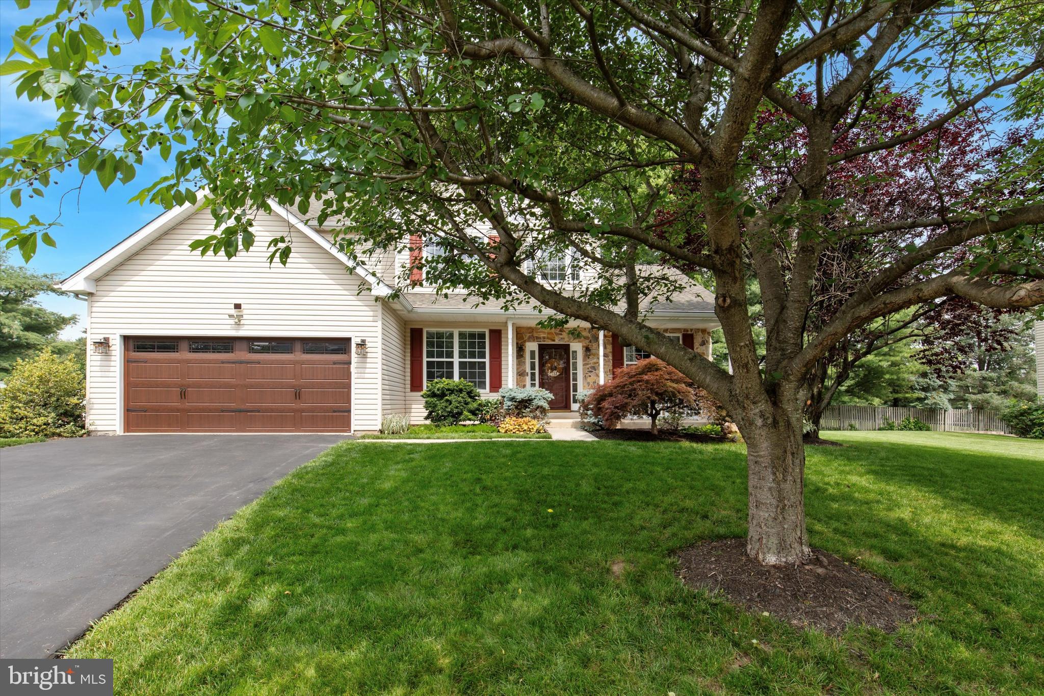 Welcome to 28 Crimson Drive, a spacious and beautifully updated home located in the highly desirable Autumn Ridge community.
Built in 2001 by the Gambone Brothers, this meticulously maintained property offers over 2,800 square feet of finished living space, a two-car garage, and a fully finished basement—all in a prime location just minutes from major highways, parks, shopping and dining. Step off the front porch and enter into the impressive two-story foyer, where natural light pours in and sets the tone for the rest of the home. To the left, you’ll find a quiet study, ideal for working from home. To the right, a living room with crown molding flows seamlessly into the elegant dining room, perfect for hosting holiday dinners and celebrations. The heart of the home is the updated kitchen, featuring white quartz countertops, custom cabinetry, stainless steel appliances, a center island, modern lighting, and beautiful hardwood floors. Open to the kitchen is a sun-filled family room anchored by a cozy gas fireplace, offering the perfect setting for everyday living. A convenient powder room and a laundry room round out the main level. Upstairs, the expansive primary suite includes walk-in closets and a spacious en-suite bath featuring a sunken jacuzzi tub, separate shower, and dual vanities. Three additional generously sized bedrooms and a full hall bathroom complete this floor. Downstairs, the fully finished basement adds incredible flexibility. One section is currently outfitted as a home gym, while the main space—with its built-in wet bar—is set up as a media and entertainment room while also offering plenty of play space for the kids. Whether you're hosting movie nights, game days, or just looking for room to spread out, this level delivers. Stepping outside, the newer paver patio provides an ideal space for dining and relaxing in your private backyard, and the shed offers plenty of storage space. NEW ROOF 2020, NEW PATIO 2021, NEW HOT WATER HEATER 2025. This well-maintained property is located in an extremely quiet neighborhood and conveniently located seconds from US-202 and minutes from the PA Turnpike, Norristown Farm Park, Elmwood Zoo, Jefferson Country Club, Plymouth Country Club, Fox Chase Center in East Norriton, and the CHOP site of Norristown.