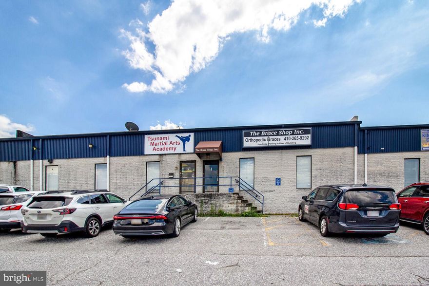 Versatile Commercial Property with Fabrication Shop & Office – Near Baltimore. Unlock the potential of this flexible commercial property ideally suited for a unique, niche fabrication or manufacturing business. Strategically located just minutes from downtown Baltimore and major highways (I-95, I-695, Route 70), this well-maintained facility offers the perfect blend of shop space, professional office areas, and logistical efficiency. 
Property Highlights:Functional Shop/Fabrication Area – Spacious open-plan layout ideal for custom production, assembly, or light manufacturing.
Welcoming Reception Area – A professional front entrance with dedicated reception space to greet clients and vendors.
Rear Loading Garage Door – Convenient rear access with drive-in overhead garage door for seamless loading/unloading.
Flexible Floor Plan – Multiple private offices, conference space, and open workspace adaptable to various business needs. Ample Parking & Access – Onsite parking with excellent truck access; close to key transportation routes.
This property is a rare find for innovative businesses seeking a well-located facility that supports both production and client-facing operations. Whether you're a creative fabricator, artisan manufacturer, or startup scaling your operation, this space is designed to grow with you. Shown by appointment only. Condominium ownership, monthly fee is $421.54 (includes CAM, trash, water, sewer)