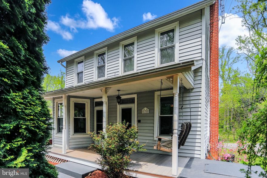 Location, location, location!! Get the best of both worlds, country living on 3.10 acres, and the convenience of shopping, dining and entertaining less than five minutes away from home. This charming 1900's renovated country farmhouse is situated on 3.10 acres in Southern Schools.  This property features a detached two car garage plus an additional outbuilding/workshop with woodstove and shed area for storing lawn tractors, etc.  Entertain friends and family on your back patio while sitting by the fire pit or spend a quite evening relaxing to the sounds of the rippling stream in your backyard.
Inside, on the main level you will find a kitchen with dining area, updated kitchen counters and cabinets, updated flooring and fresh paint throughout the entire house.  Off the kitchen is a family room with storage closet.  Upstairs there are two bedrooms with ample closet space, a full bathroom with double vanity and tub/shower combination, walk up access to a large attic perfect for storage.  The laundry and utilities are located in the basement.  The mudroom is located off the kitchen and provides access to the basement and back patio. This home features a covered front porch with swing and stamped concrete walkway that leads to the driveway and detached two car garage.