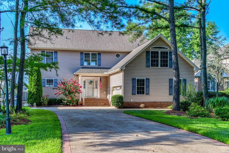 Stunning  4BR/2.5BA with loft waterfront home with breathtaking views and a 10,000 lb boat lift.   From the moment you walk into this home you will fall in love with the tranquility of the water and the natural light. The foyer leads to a family room that overlooks the water with a sliding glass door to a large deck. The wonderful chef's kitchen is sure to delight the cook in your family. There is a Viking gas cooktop & double wall ovens, stainless steel appliances, granite countertops and lots of storage. The dining room flows off the kitchen for enjoying dinners with family and friends.  There is a sunroom off the kitchen to relax and take in the water views while enjoying your coffee. This first floor is completed by the first floor master bedroom overlooking the water with a slider leading to the deck.  The master suite also has a  walk-in closet and jacuzzi tub.  On the second floor there are 3 additional bedrooms and a loft with bonus room that could be used as a second family room. There is a large Trex deck with retractable electric awning.  The property has a bulkhead, lawn irrigation, oversize 2 car garage, gas fireplace, 2-zone HVAC and tankless Rinnai hot water heater. This is a must see. This home is being sold fully furnished for your immediate enjoyment.