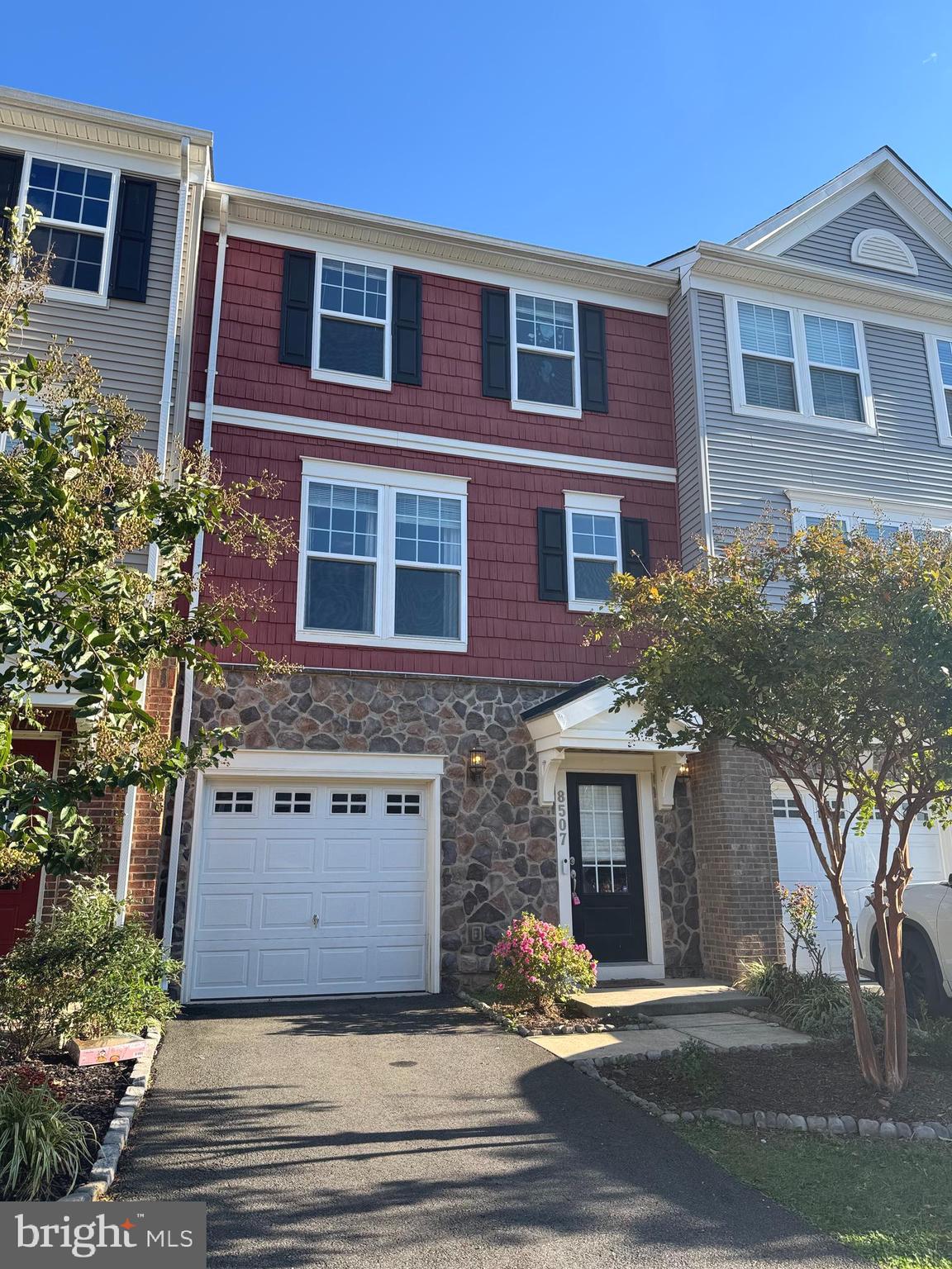 This beautifully designed townhouse offers 4 bedrooms and 4 bathrooms, along with a one-car garage. The entry level includes a bedroom and full bathroom, with easy access to the backyard. Upstairs, you'll find an open-concept layout featuring a gourmet kitchen, dining area, living room, powder room, and a deck. The top floor includes three more spacious bedrooms and two full bathrooms and laundry room. Ample of guest parking nearby.