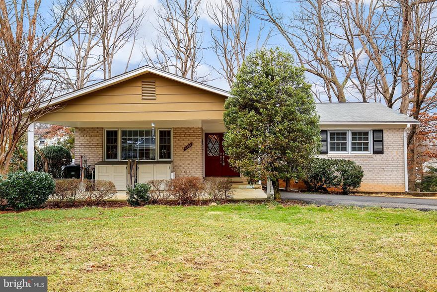 Great open floor plan perfect for entertaining! Remodeled eat-in kitchen with granite counters and SS appls.  Remodeled baths. Large windows and skylights. Gleaming hardwoods. Office with floor to ceiling built-in shelving. Spacious wrap-around deck providing plenty of room for separate dining, entertaining, grilling, and relaxing areas. Fenced backyard. Minutes to 286, Metro and VRE.