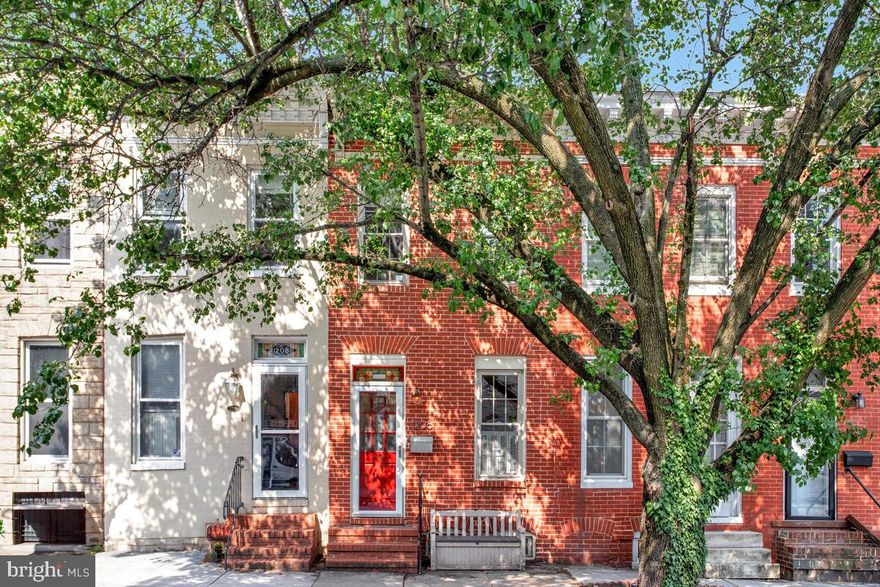 ***OPEN HOUSE, SATURDAY, JUNE 14TH FROM 12-2 PM*** City Living! The location is unbeatable—just blocks from the lively Cross Street Market and the vibrant restaurants and nightlife that define Federal Hill. Whether you’re grabbing brunch, a cocktail, or a meal, the city’s dining and bar scene are minutes away. Federal Hill Park—with its sweeping harbor views—and the tranquil, tree-lined paths of Riverside Park enhance city living. Sports fans are just a short stroll from M&T Bank Stadium and Camden Yards, making it easy to cheer on the home team. Your future home is close to BWI for those accruing frequent flier miles and commuter friendly to Washington DC via Camden Station. So much to offer, why not live car free? An open floor plan on the main level features hardwood floors and an open kitchen with granite countertops, stainless steel appliances, and ample storage space. A striking spiral staircase with 32-inch wide wood steps serves as a unique architectural centerpiece, guiding you to the second floor and providing more space and light on main level. Skylights flood the upper level with natural daylight, so people and plants can bask in sunshine. The finished lower level offers a versatile bonus space—ideal for a home office or media/game room. Custom built-in shelving provides a stylish display for books and collectibles, while a full bathroom and dedicated laundry room are steps away. Enjoy a lock and leave lifestyle - explore the world and Fed Hill!