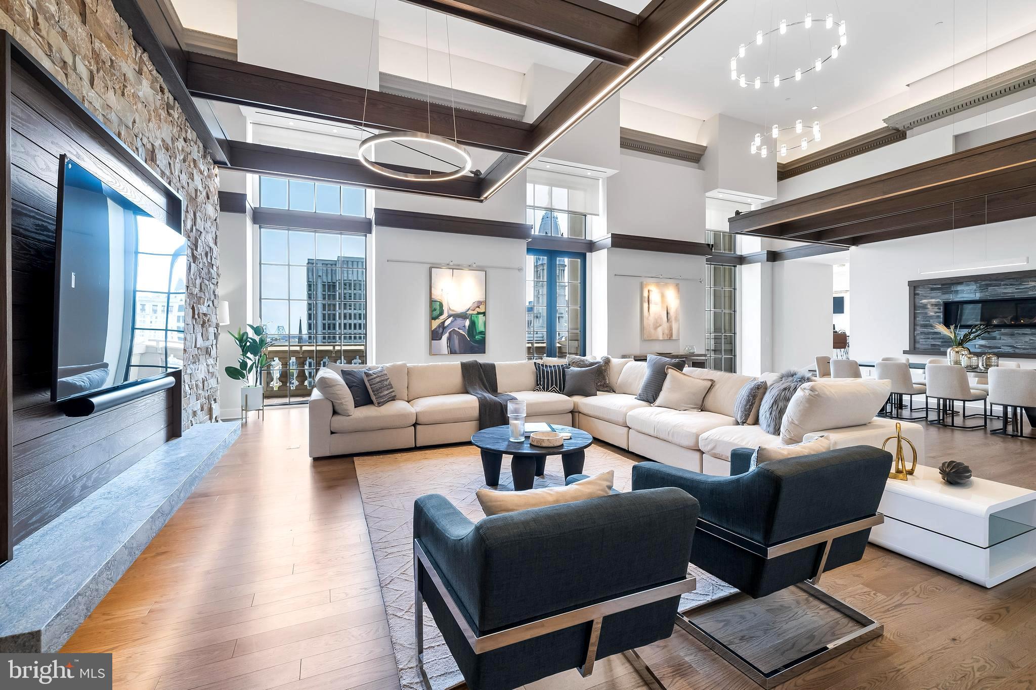Welcome to 1600 Arch Street #1621, a stunning residence in the heart of Philadelphia.
This exceptional residence boasts a spacious layout of 3 bedrooms, 3 bathrooms, and a bonus room that can be used as a den, nursery, or smaller bedroom. The expansive floor plan spans over 3752 sq. ft. providing ample space for entertaining, relaxing, and working from home. In addition to the luxurious living space which features beautiful balconies with stunning views of Love Park and City Hall, this property comes with 4 available parking spaces located under the building, offering added convenience and security. The valet parking service means that you never have to go to your car, allowing you to fully enjoy the benefits of living in the heart of the city as well as, the direct access to Suburban Station right from the residence elevator for travel convenience.
The residence also features a massive great room with a custom built-in limestone fireplace, perfect for cozying up on chilly evenings and adding to the overall warmth and comfort.
This is a chef's dream kitchen with wonderful outdoor space that features an island kitchen with a quartz countertop, tile backsplash, wolf appliances, a sub-zero refrigerator, a wine refrigerator, and a pantry for added storageāa large laundry room equipped with custom storage space. The primary bedroom showcases stunning views from floor-to-ceiling windows and features an en-suite spa-like master bath with a full shower, soaking tub, and double vanity sink. The second bedroom features adequate space and a custom bath with a tile shower and vanity. There is no shortage of space, as the third bedroom is equipped with another full bath and vanity. Working from home can be a breeze with another bonus room added that can serve as a den or nursery. Don't miss this incredible opportunity to live in a stunning residence with exceptional amenities and a prime location in the heart of Philadelphia. The Phoenix offers direct elevator access to Suburban Station right from the residence elevator, allowing you to go to Paris without ever leaving the building. You can also enjoy breathtaking views of City Hall, Love Park, and the bridge from the panoramic roof deck in your very own home. Additionally, this property offers a unique living experience that combines the charm of the past with the comfort of the present. The historic details of the building, such as the original marble floors, elegant chandeliers, and ornate moldings, have been carefully preserved and restored, adding to the overall elegance of the residence. The building boasts an on-site fitness center, media center, conference room, restaurant, and stunning roof deck with beautiful city views. The expansive hallways have granite walls and concrete between floors for sound, ensuring privacy and comfort. Whether you are a history buff, a foodie, or a shopaholic, this location has it all. You can enjoy world-class dining, shopping, and entertainment, all within walking distance. With its prime location and exceptional amenities, this residence truly has something for everyone. Located across the street from City Hall and Love Park, this property is conveniently located in the heart of the city, providing easy access to I76 and I95 from The Benjamin Franklin Parkway. You can visit all the museums, including The Barnes and Philadelphia Art Museum, and even witness the Mummer's Day parade on the parkway. This grand property seamlessly blends the Georgian Revival Style architectural detail with modern-day concepts, offering an exceptional living experience.
Built-in 1925, this building was the first insurance company in North America named INA, making it a significant part of the city's history. The Penthouse was once home to many celebrities and was filmed in a movie. Don't miss out on the opportunity to live in this exceptional residence that seamlessly blends history, luxury, and convenience. This is a must-see!