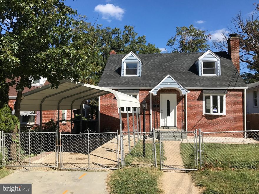 Fully Fenced Solid Brick Home, Beautifully Renovated Top To Bottom.  New Roof, New/newer Windows. New doors, New Kitchen W/ Granite, SS Appliances, Ceramic Tile Floors, Hardwood Floors, Crown Moulding, All New Light Features, New Custom Designed Baths,Newly Finished Basement w/Kitchenette & 2 BR,New HVAC & Water Heater, New Washer/Dryer. Close To Route 201, 410, 295 and 495. Walk to Metro Bus.