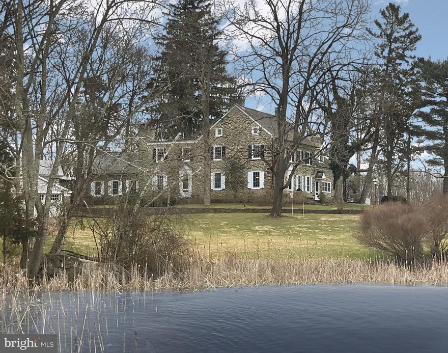 Visit 1115Strawntown3D for 3D walkthrough, and https://www.seetheproperty.com/u/277102 for photos, floorplans & more!  The soul of a Bucks County gentleman's farm is evidenced at first approach, with a long, private drive and gated entry. Fulfilling & surpassing all expectations, the magical qualities of Strawntown Farm begin at introduction to the enchanting stone farmhouse, with a c.1754 origin, & homestead to Jacob & Enoch Strawn. Centered in a remarkable setting, the buildings are surrounded by their own 121 acres, adjacent to 100s of acres of preserved property, with over 5800 acres of state and county park lands nearby. In keeping with the role of a quintessential Bucks County farm, bucolic vistas grace every window... overlooking a classic red barn, adjoining fenced pastures & a large spring-fed pond with dock & stone springhouse. The original farmhouse has been appreciated & tended for generations, boasting vintage architectural antiquities such as exposed stone walls, 6 FPs, an original stone sink, pumpkin pine floors, beamed ceilings & deep windows w/old glass. A recent addition offers an exercise room with resistance pool. The living room, keeping room & family room all have period and walk-in fireplaces & the formal DR opens to a stunning kitchen/great room with custom cabinets, granite countertops, gourmet appliances & cozy fireplace. A private billiard room is tucked away on its own floor. On the 2nd floor the cathedral-ceilinged master bedroom suite has built-ins, walk-in closet & skylit master bath. 3 additional bedrooms & 2 baths complete the 2nd flr. Capturing a trifecta of classic PA farmland, pond, and magnificent barns, these spaces beckon you to while away an afternoon or to walk the acreage on starlit evenings. There is an orchard, raised garden beds, a greenhouse and extensive irrigation system. Multipurpose buildings are perfectly-positioned amidst the rolling acreage, overlooking vistas of manicured horse pastures. The bank barn has been restored, and offers 4 stalls, an adjacent 3 bay garage has a tack room, and the 80'x80' indoor riding arena opens to multiple pastures, dressage ring, run in sheds & miles of raised walking/riding paths. For the horse enthusiast, these facilities rival the best of the best. An authentic log cabin was moved from Ohio & renovated in 2012. This romantic getaway has a living room w/fireplace, vaulted beamed ceilings, keeping room & sleeping loft. Truly beyond the imagination and beckoning one to stay forever, Strawntown Farm is one of the jewels of Bucks County, serenely located in an exquisite and secluded setting.