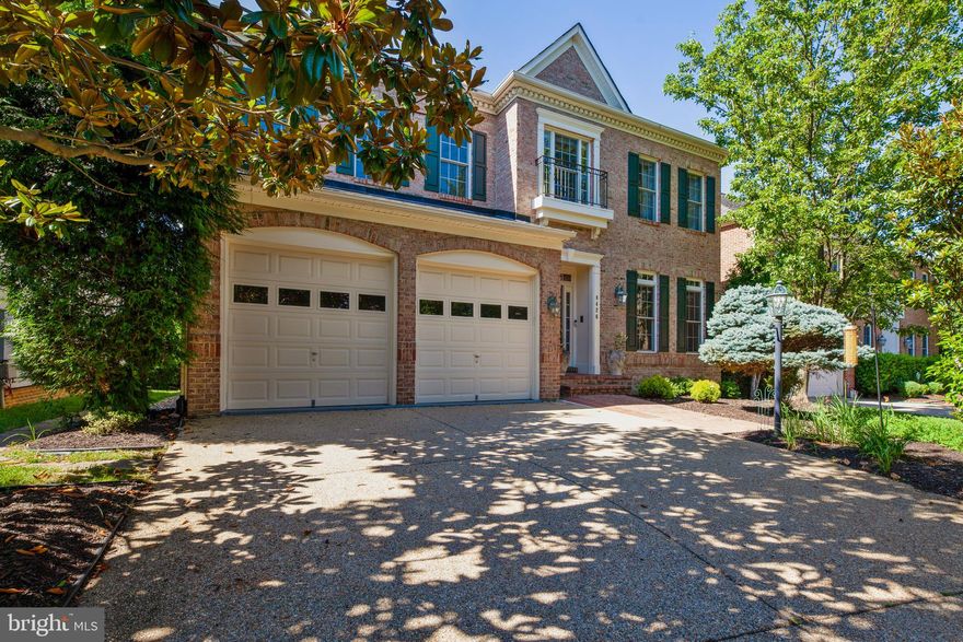 Gorgeous, Immaculate & elegant move-in-ready Parkdale Model with loft in the sought-after Tysons Trace community.  The home is one of the largest models in the Tysons Trace community boasting over 5,500 square feet of living space.  This home is very spacious and features 5 Bedrooms / 5.5 Baths w/loft suite on 4th level.  The large master bedroom has lots of windows for natural light and offers two walk-in closets, a large master bath with whirlpool, separate shower and private toilet. The massive family room features a stone fireplace and leads you into the upgraded gourmet kitchen featuring THERMADOR Stainless Steel appliances, spacious kitchen table area which leads you into the large deck backing to a beautiful private yard. The main level offers a large private office.  The home features lots of rich crown moldings and beautiful hardwood floors on the entire main level.  The beautiful lower level has a gas fireplace, surround sound pre-wire, an awesome wet bar, wine cellar, exercise room, au pair suite and full bathroom.  This home offers tons of upgrades such as THERMADOR kitchen appliances, Samsung washer and dryer, Sprinkler system throughout the house, Upgraded silent garage openers, whole house water filter, Water softener, Two water heaters, Central Vac, Humidifier, and much more!!!   Conveniently located near the Metro/Tysons silver line, major routes 123, route 7, I-495, minutes from the Tyson I & II Malls and lots more!!!