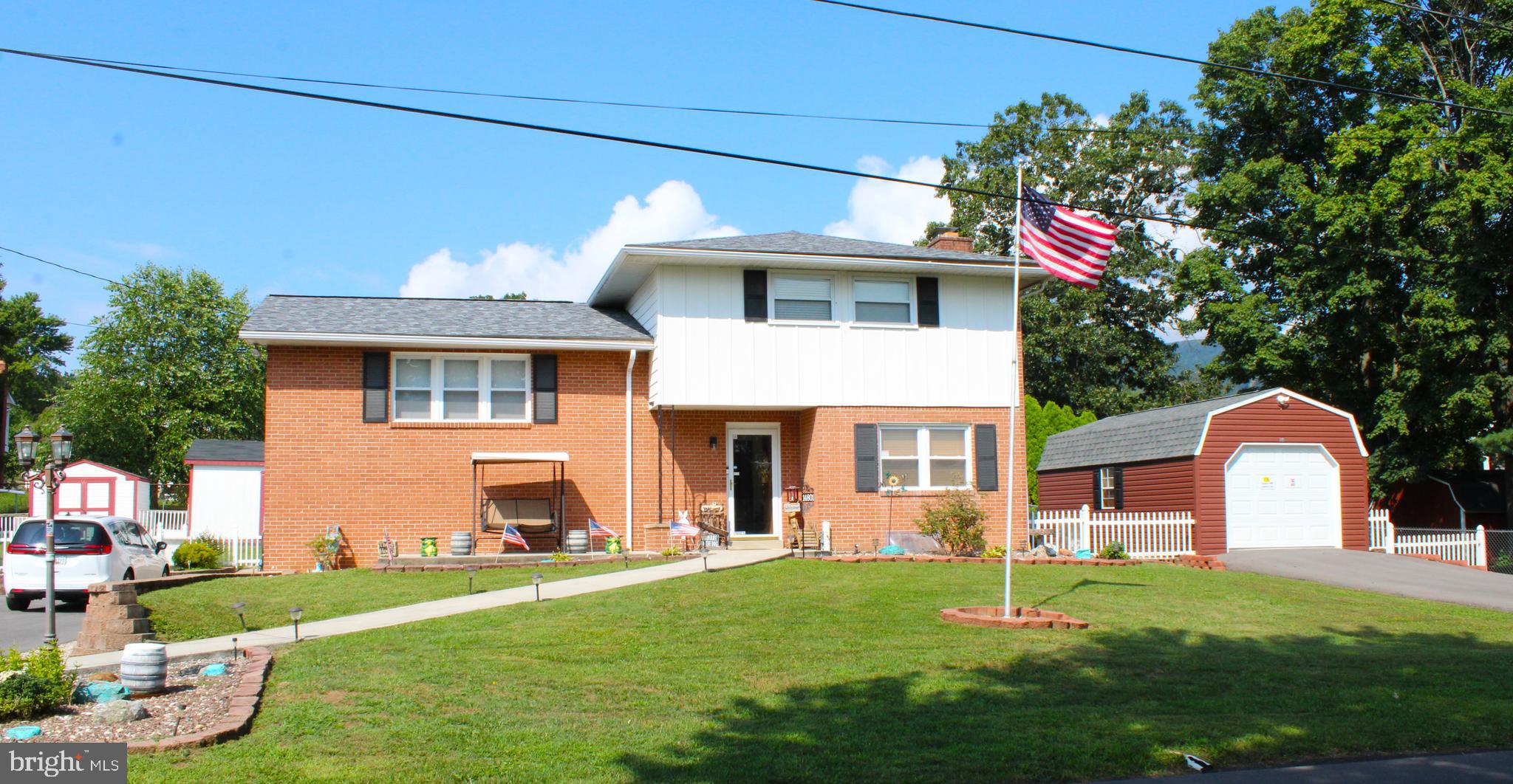 Beautiful Tri-Level absolutely stunning move in condition home in an excellent location. This home has been well taken care of. Beautiful kitchen with ample cabinets, dining room living room and family room with hardwood floors. A Sunroom retreat is a nice get away spot. Upgraded furnace and roof, extensive landscaping, paved driveway 3 storage sheds, multiple outdoor entertaining areas and it even has a firepit. nice fenced rear yard is great for pets, This home is beautiful and you will not be disappointed. I can not fully explain how nice this home is, you have to come see it for yourself. Ample parking with a garage and paved driveway. You too can be the envy of the neighborhood. Check out these upgrades: New roof 2024, Deck built 2020, fir pit built 2020. Driveway paved 2020, Sunroom new windows and siding 2020, New kitchen cabinets and double wall oven 2019, JUST TO NAME A FEW!!!!