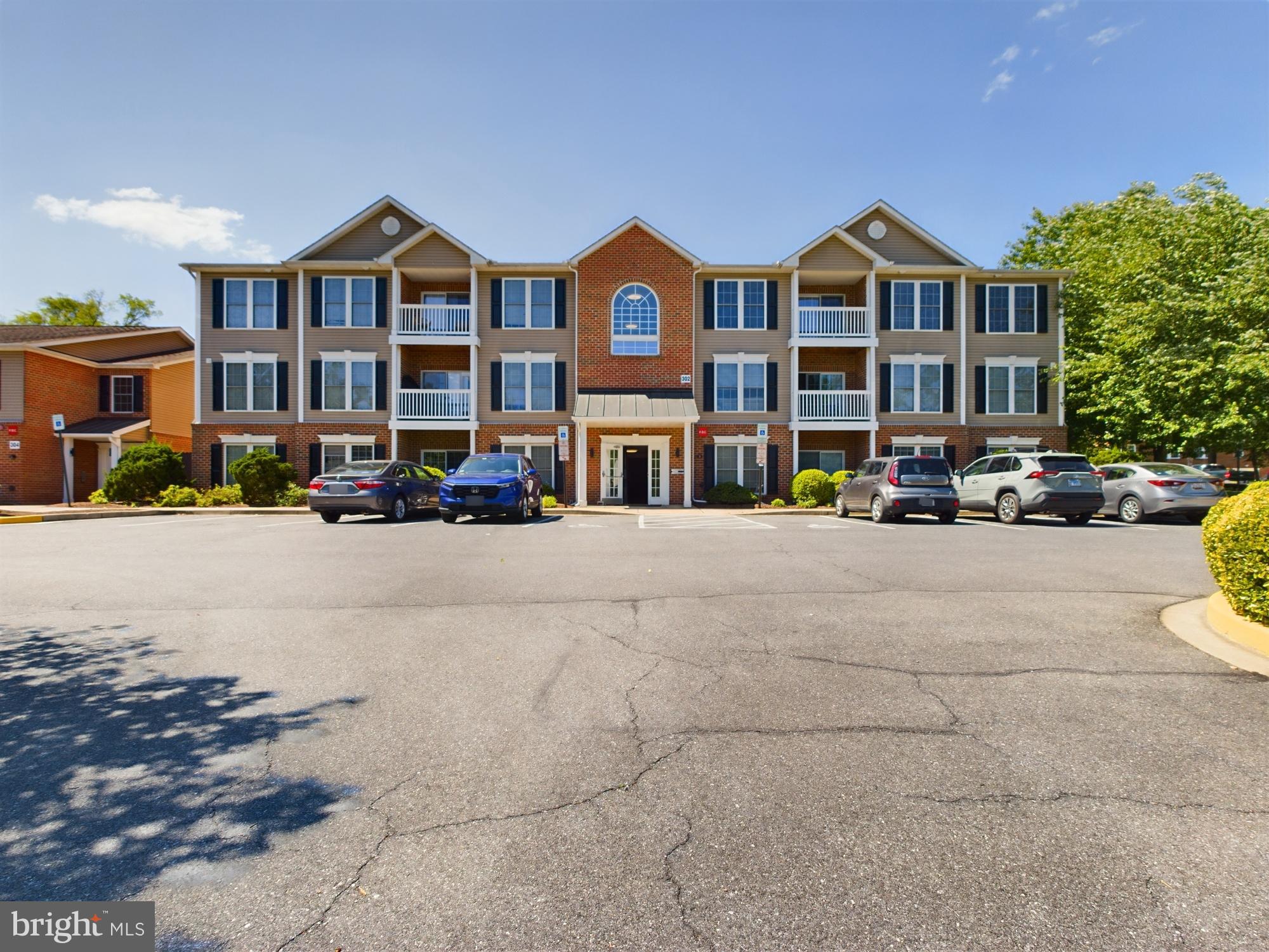 Discover the perfect blend of comfort and convenience in this upgraded GROUND FLOOR 2-bedroom, 2-bathroom condo located just minutes from downtown Frederick. With 1,008 sq ft of living space, this spacious unit features an open floor plan with updated laminate flooring and carpet throughout. The modern kitchen boasts stainless steel appliances, a large breakfast bar, and an adjoining laundry room with front-loading washer and dryer.
Relax in the large living area that opens to a beautiful private patio, perfect for morning coffee or evening relaxation. The primary bedroom offers a large walk-in closet and an en-suite bathroom with dual vanities.
Located in a secured building with entry lock and intercom system, this condo ensures both safety and privacy. Enjoy easy access to major highways, making commuting a breeze. The vibrant local area offers a variety of attractions including restaurants, shops, and parks. Experience the best of Frederick living in this well-maintained, stylish home. Don't miss the opportunity to make it yours!