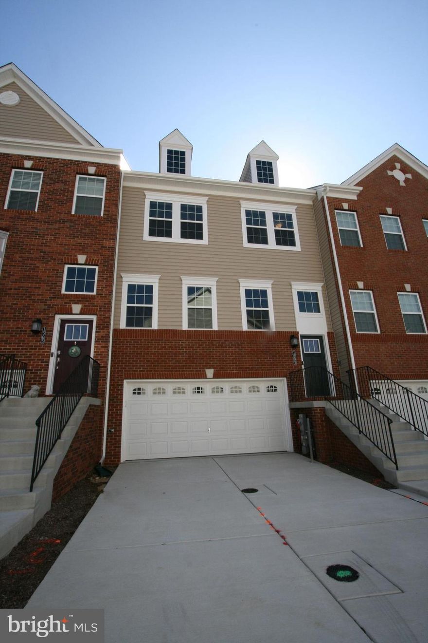 Townhouse in new condition, features 2 car garage with garage door opener and two remotes. Upper level has three bedrooms and 2 full bathrooms, laundry is also on the bedroom level. Middle level has Kitchen with granite counter-tops, island, stainless steel appliances, gas for cooking, open to dining area and living area, powder room is also on the mid level, large walk-in pantry with built in wine rack. Main level has family room with sliders to the exterior yard and a Half bathroom. . Immediate Occupancy! You don't want to miss this one, no need to cut the grass. Lawn maintenance and Pool fee is included in the rental price. Close to Wegmans, Movie Theater, Restaurants at the Waugh Chapel Shopping Center!