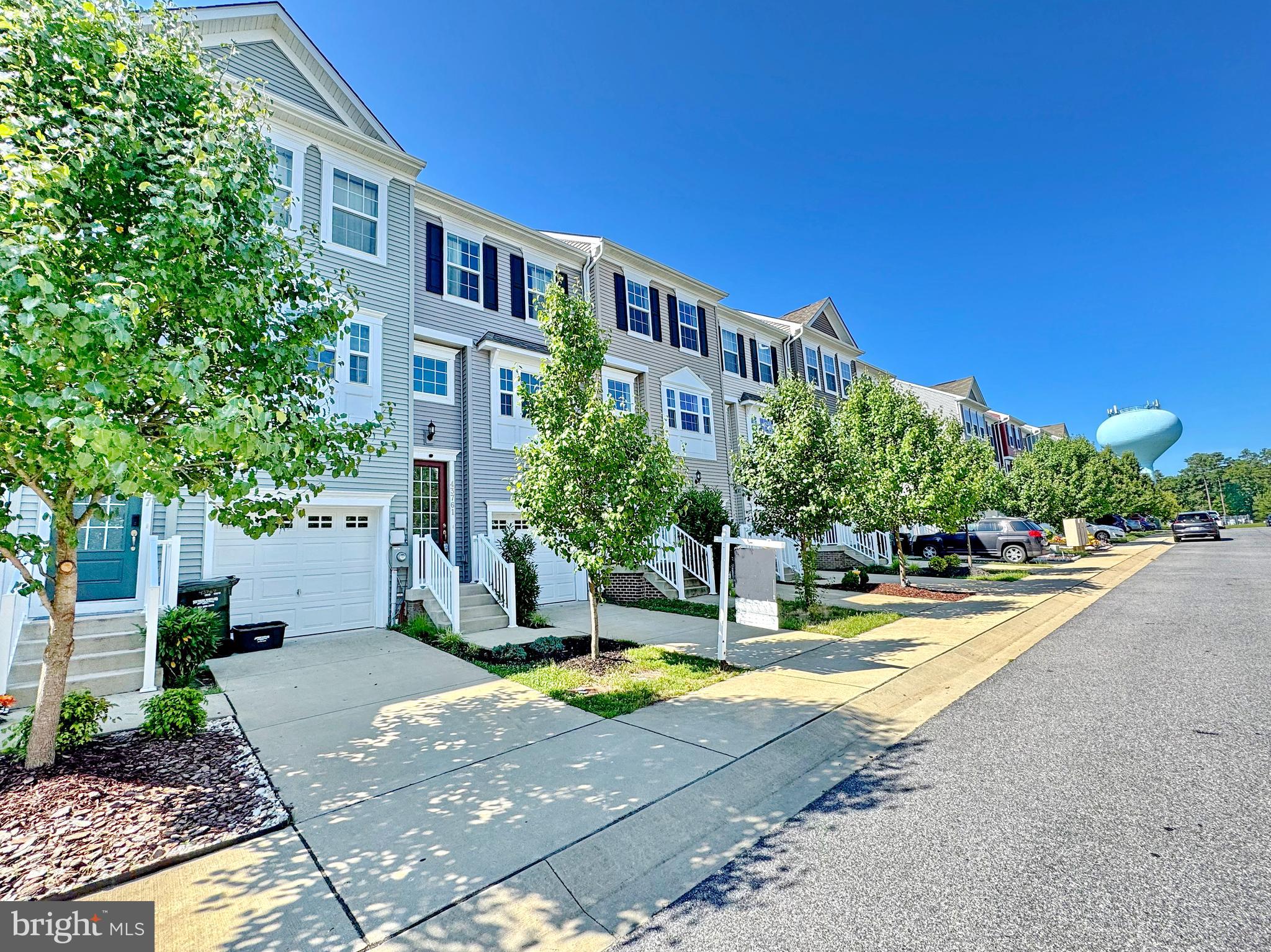 Welcome to Evergreen Park at Wildwood! This like new unit shows like a model. Original owner, you can't miss the pride in ownership. LVP flooring, & 9' ceilings throughout your main living area. Quartz countertops, upgraded gray cabinetry, and black appliances highlight the kitchen. Custom trek/vinyl sun deck. The lower level is currently used as the most awesome man cave, but would also make a nice in law suite, or guest quarters. The upper floor boost two huge primary style bedrooms. Each with closet space galore. Garage & driveway offer ample off street parking, with plenty of guest spaces right around the corner. Bike to the pool in the morning, or jog around the beautiful community in the evening. Whatever your hobbies may be the active Wildwood community has something for ya. Truly a must see.