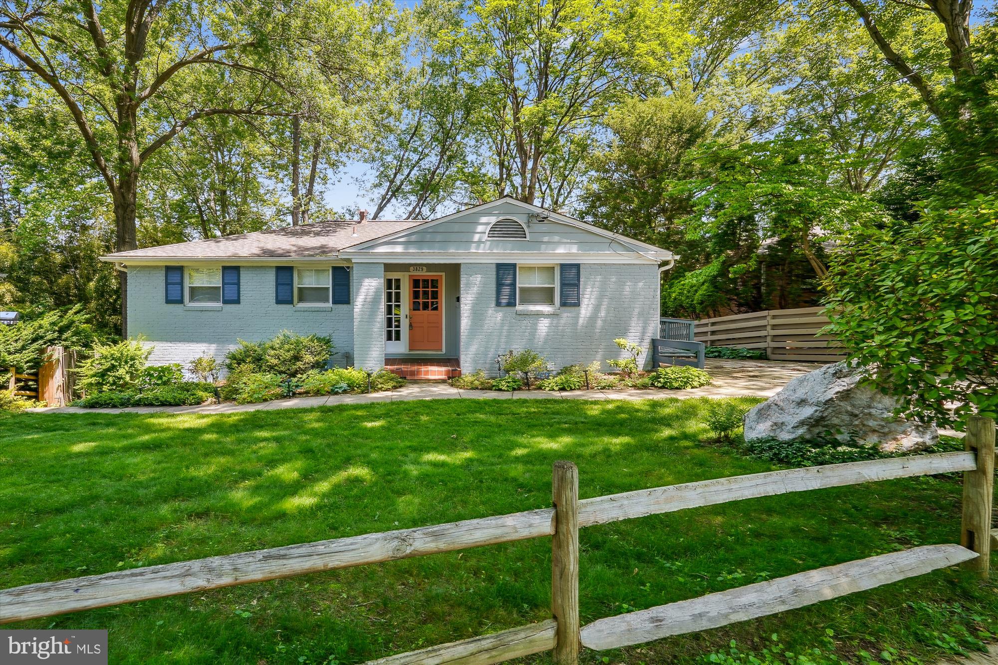 This 4BR/3BA mid century ranch features an open concept upgraded kitchen, dining, and family room.
Exposed brick adds interesting detail while two sliding glass doors and a picture window provide plenty of light and views of the beautiful trees. The deck is the perfect hangout spot for friends and family. The kitchen features upgraded stainless steel appliances. The main level also features a sunroom that is soundproof, offering some privacy and a perfect space for working from home along with a beautiful view. Also on the main floor are three bedrooms and two bathrooms. The primary bedroom features an ensuite bathroom with shower.
The basement offers even more square footage, including a large rec room and an additional bedroom and full bathroom! A spacious laundry room area can double as a storage space. From the rec room, double sliding glass doors open onto a sizeable patio that's perfect for entertaining and play in a private, fenced in yard.
This lovely home offers square footage rare and great location, with easy access to Kensington, Bethesda, and Rockville. You won't want to miss out on this opportunity!
