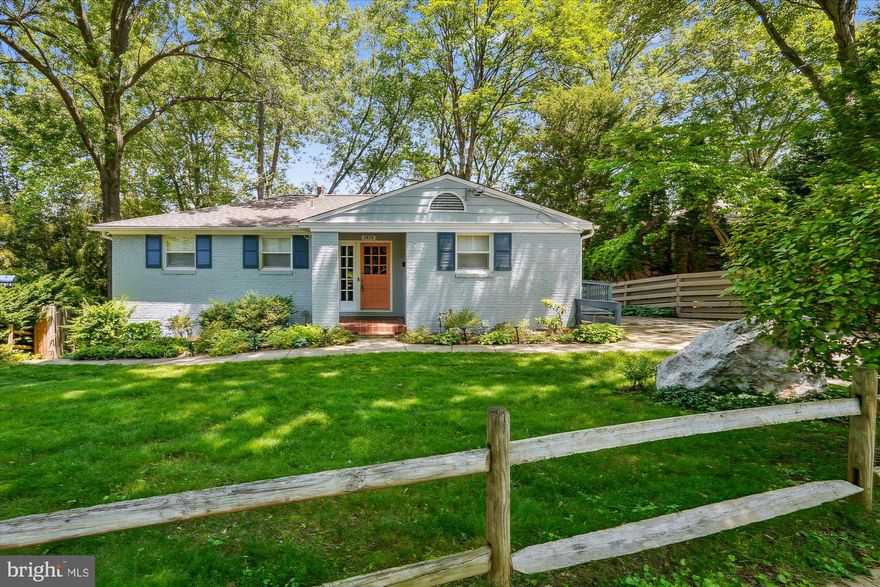 This 4BR/3BA mid century ranch features an open concept upgraded kitchen, dining, and family room.

Exposed brick adds interesting detail while two sliding glass doors and a picture window provide plenty of light and views of the beautiful trees. The deck is the perfect hangout spot for friends and family. The kitchen features upgraded stainless steel appliances. The main level also features a sunroom that is soundproof, offering some privacy and a perfect space for working from home along with a beautiful view. Also on the main floor are three bedrooms and two bathrooms. The primary bedroom features an ensuite bathroom with shower.

The basement offers even more square footage, including a large rec room and an additional bedroom and full bathroom! A spacious laundry room area can double as a storage space. From the rec room, double sliding glass doors open onto a sizeable patio that's perfect for entertaining and play in a private, fenced in yard.

This lovely home offers square footage rare and great location, with easy access to Kensington, Bethesda, and Rockville. You won't want to miss out on this opportunity!