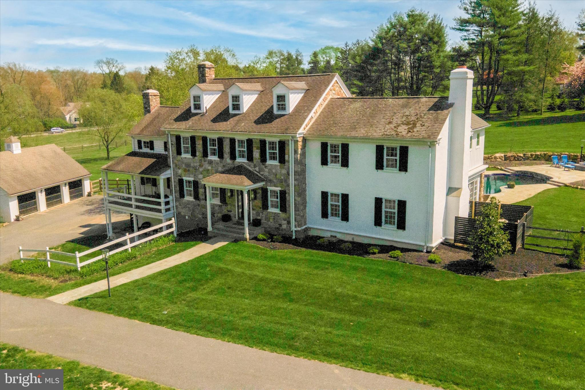 Sale includes two parcels: 53-04R-0033 (Approximately 3.7 acres) and 53-04R-0030 (Appromximately 3.1 acres)
Enchanting farmhouse located on 6+ breathtaking acres with a pool and tennis court. This 4 Bedroom 3 Full Bath/ 1 Half Bath home went through an extensive two year renovation adding modern amenities while preserving the historic charm and integrity of the property.
Enter the home and see the beautiful hardwood floors and wooded fixtures. Walk further in and sit in the open living room with two built-in bookshelves and a stunning wood fireplace. The formal dining room boasts a historic-looking stone wall and wooden framed window paneled doors that open to the gorgeous outdoor pool. Enjoy ample amounts of natural light with the many window-doors and open living spaces. The master bedroom includes a walk-in closet that opens up to a private balcony. The private balcony looks over the pool and allows an unobstructed view to the tennis court and outdoor seating area.
Relax in the stunning wooden gazebo while watching a tennis match on your personal court. Located across the street from Ashbridge Preserve and close to schools, dining, and roadways for easy commuting, this family home has everything you need.
Other aspects of this property include a newly refurbished chicken coop for livestock and a barn in close proximity. This property holds the proper zoning for up to four horse stalls. 337 Wyllpen Drive and its refurbished chicken coop, beautiful barn, and zoning for four horses presents an unparalleled opportunity to embrace a harmonious blend of functionality and equestrian lifestyle.