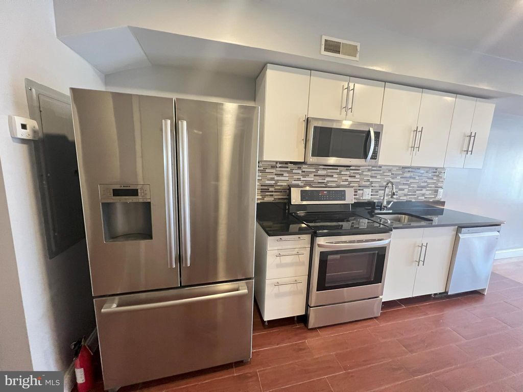Photo of 615 N 11th Street, PHILADELPHIA, PA 19123 (MLS # PAPH2548522)