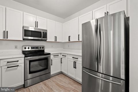 Photo of 4551 Strutfield Lane #4122, ALEXANDRIA, VA 22311 (MLS # VAAX2058200)