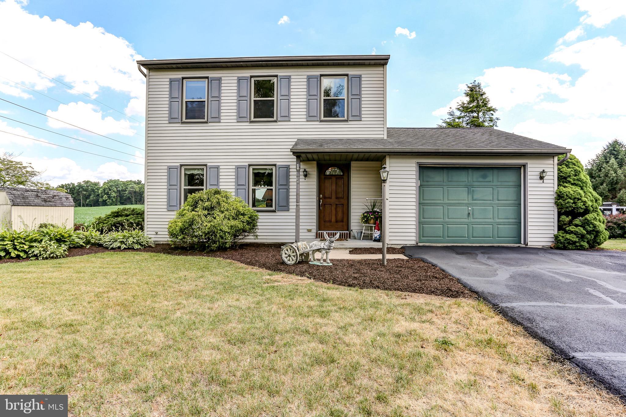 This charming Mount Joy Township home boasts a fresh landscape.  Relax on the deck overlooking the peaceful countryside and enjoy the cool summer breeze. Inside, you'll find a comfortable living space with central air and a heat pump gas system for year-round comfort. Plus, a new roof and a recently updated heating system ensure peace of mind.  The property features a 1 car garage and a large yard. Inside, central air conditioning keeps you cool, while the heat pump gas heating system ensures year-round comfort.  Enjoy peace of mind with a brand new roof, updated heating system, and a 200-amp electric service. The home also features private water with public sewer for convenience, along with a UV light water treatment system for added peace of mind.  Step inside to new carpeting throughout the first floor and beautiful vinyl flooring. Newer windows and doors create a bright and airy feel, while the eat-in kitchen dining area offers a warm and inviting space. Appliances, including a fridge, stove, dishwasher, and microwave, are all included! A convenient half bath with laundry on the first floor adds functionality.  Upstairs, three nicely sized bedrooms with ample closet space share a full bath with a large linen closet for additional storage. The finished basement provides even more living space, with a bonus room which could serve many uses , a family room, and a water softener system.  Don't miss this fantastic opportunity!