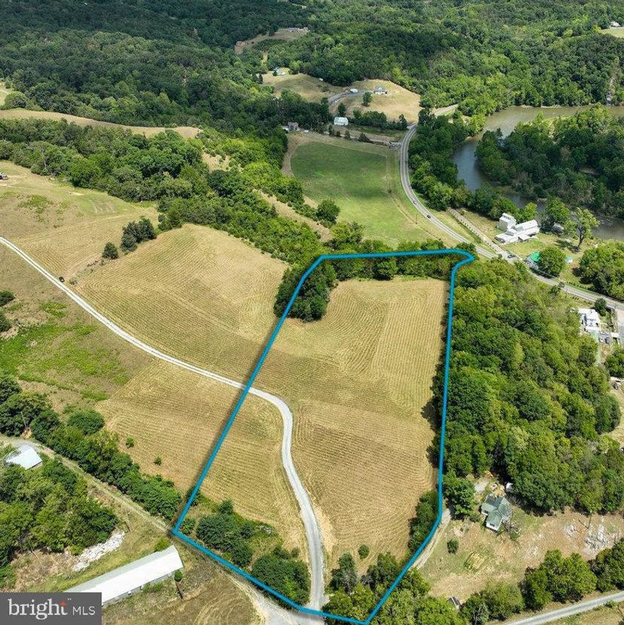 Outstanding 7+ acre farmette at Galloway Springs Farm ! This property offers superb privacy and breathtaking panoramic and pictorial views and is located only thirty minutes from Harrisonburg, just over an hour to Charlottesville, and less than two hours from both Washington D.C. and Richmond. There is also easy access to the Shenandoah River, George Washington National Forest, Shenandoah National Park, Luray Caverns, and Massanutten resort. The Property is zoned Agriculture and is currently producing hay. The property qualifies for land use, keeping the annual real estate taxes extremely low. Short-term vacation rentals are allowed and there is NO HOA! Access to the South Fork of the Shenandoah River is located near the property at the public boat landing, adding to the endless outdoor recreational possibilities. A  gravel driveway has been installed, a survey has been completed, and a three-bedroom conventional septic letter is on file.  Do not let the opportunity to own a farmette in the cabin capital of Virginia pass you by.