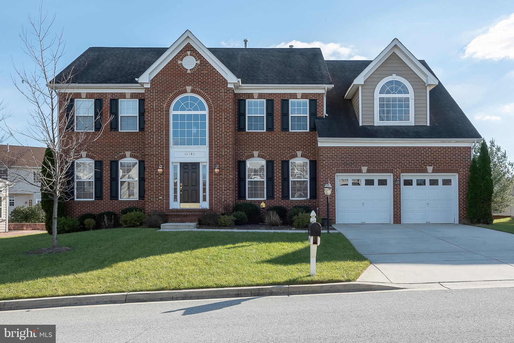 Welcome home! This brickfront beauty has the stuff that dreams are made of! The main level boasts a soaring 2 story foyer, gleaming hardwood floors, formal living & dining rooms, a separate office & sun-sational morning room, a sunken family room with fireplace, and a powder room. Prepare gourmet meals amid stainless steel appliances, granite counters, 42" cabinets, and an island breakfast bar... Upstairs are 4 spacious bedrooms - one ensuite with it's own bathroom while the 2nd and 3rd bedrooms share a jack-n-jill bath. But perhaps the highlight of this stunning home is the massive master suite which comes complete with a sunken sitting room, 4 walk-in closets, a 2-sided fireplace, columned soaking tub, a huge roman shower, and his & hers vanities... Finally, the lower level has a finished recreation room, a full bathroom and space for a media room, gym area, storage and/or additional bedrooms... Extras throughout this home include a security system, recessed lighting, crown & chair molding, gas heat, ceiling fans, main level laundry room, a 2 car garage, a 4 car driveway, and a 1/4 acre level lot... In all, almost 6000 sq ft of absolute awesomeness priced about the same as nearby newly constructed townhouses. To see it is to believe it!