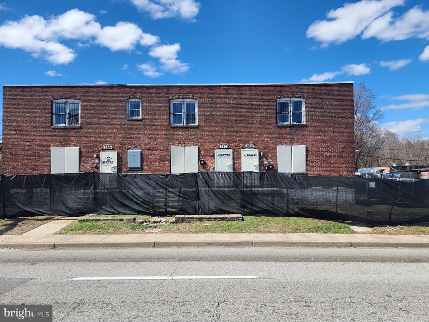 Interior brick townhome is currently set up as 2 units.  Each unit consists of a living room,  efficiency kitchen, 2 bedrooms and 1 full bath.   New LVP flooring through out,  New Water Heaters , New furnace for main level unit and new Rubber Torch down roof.  Other updates included; new ceiling fans, some new interior doors, windows, lighting, toilets and vanities.