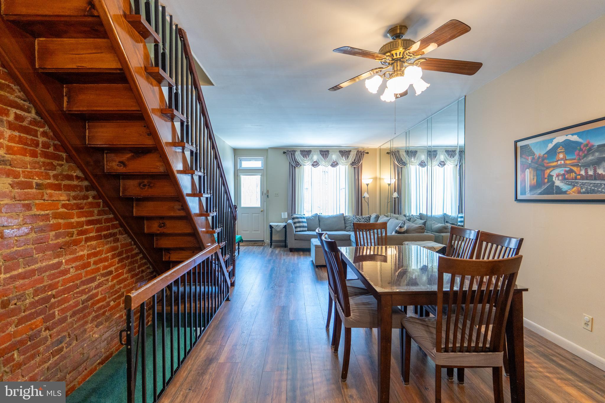 Charming South Philly Home in Girard Estate! Welcome to this spacious 3-bedroom home offering generous room sizes and hardwood flooring throughout. Enjoy two full bathrooms - one on the second floor and another in the partially finished basement, which also includes a bonus room and a dedicated laundry area. The kitchen leads to a convenient mudroom/pantry and opens to a fenced backyard, perfect for relaxing or entertaining. This home is nestled in a highly desirable neighborhood that blends city living with a suburban feel. Walking distance to schools, restaurants, grocery stores, public library, public park, and all your daily essentials. Don't miss the chance to make this your new home!