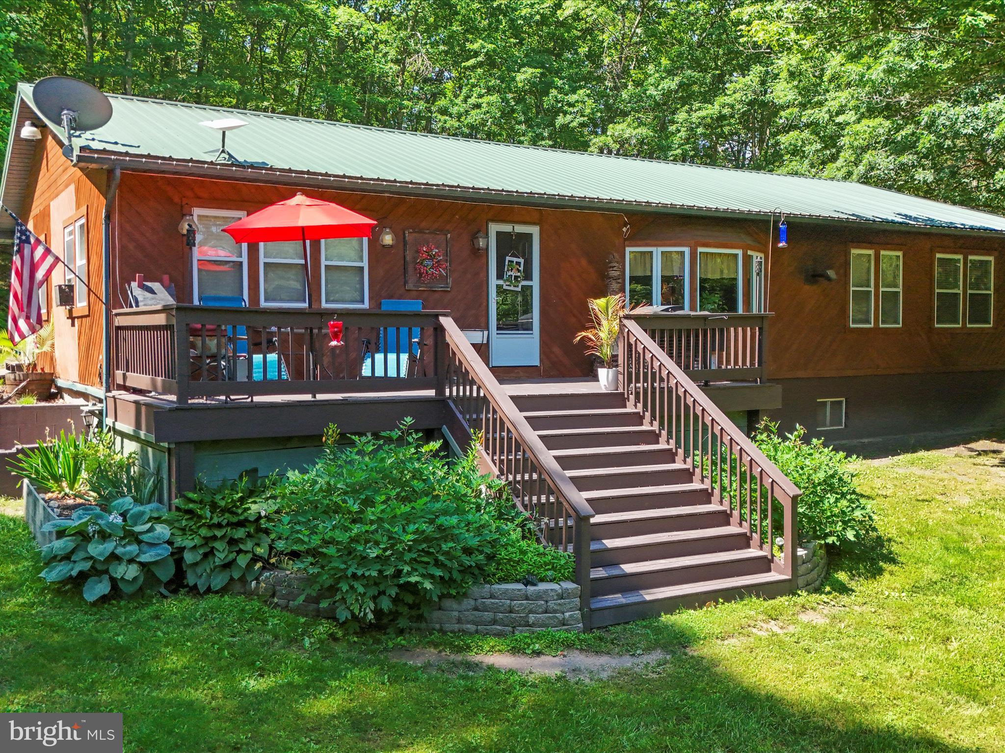 You were looking for it... YOU FOUND IT-- "Where the blacktop ends..." The perfect combination of privacy and nature you find in the country with the modern conveniences (like STARLINK internet) of the city. This property provides more than enough space for all your heart desires--from the FOUR bedrooms, to the two full baths, to the entire basement just waiting for your finishing touches. Nestled on 2 and a half acres of Wild and Wonderful WV this property has one more incredible benefit -- an ASSUMABLE MORTGAGE!
Only 2 hours from the major metropolitan areas, this home is waiting for you to call it yours!