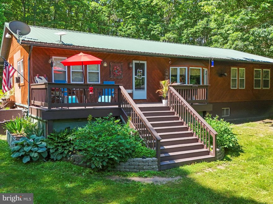 You were looking for it... YOU FOUND IT-- "Where the blacktop ends..."  The perfect combination of privacy and nature you find in the country with the modern conveniences (like STARLINK internet) of the city.  This property provides more than enough space for all your heart desires--from the FOUR bedrooms, to the two full baths, to the entire basement just waiting for your finishing touches.  Nestled on 2 and a half acres of Wild and Wonderful WV this property has one more incredible benefit -- an ASSUMABLE MORTGAGE!

Only 2 hours from the major metropolitan areas, this home is waiting for you to call it yours!