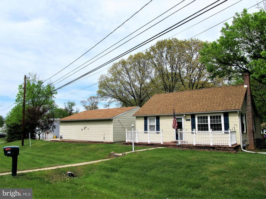 This updated rancher is move-in ready. 3 BR, 2 bath home features Brazilian cherry hardwood flooring, granite countertops & pellet stove.  Fully finished basement with spiral staircase & walk out entrance features master bedroom suite w/ 12' closet, bath w/ceramic tile shower & built in bench, home office & add'l storage space.  Detached 900 SF garage has over 10' ceilings & 100 amp service.