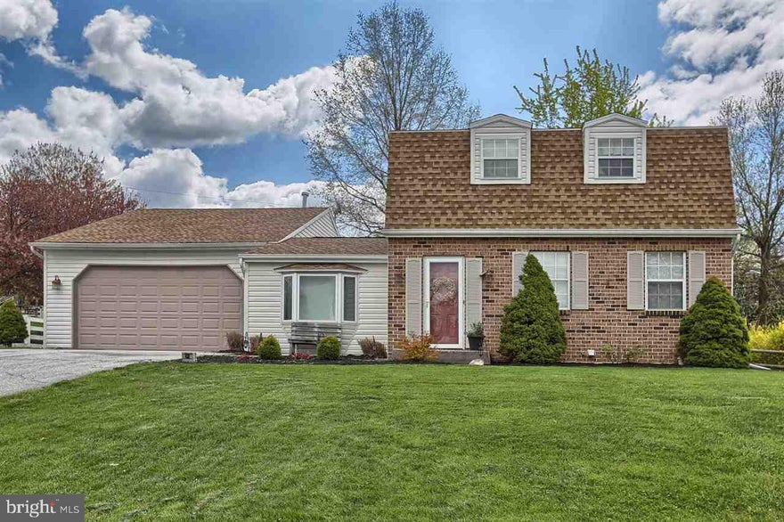 Story book Dutch Colonial that's move-in ready! Great decor & color scheme throughout! Kitchen opens up & family room on first floor is a great club room! Fall in love with the 4 car tandem garage with 11 foot ceilings & it's own heat! A great catch at this price!