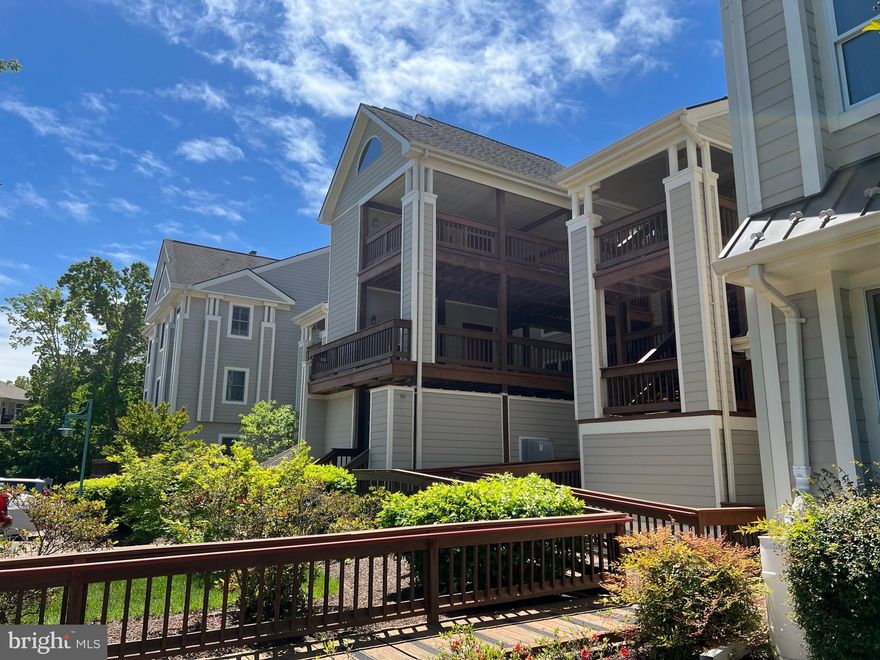 Top level condo with partial waterview & 35 x 15 Boat slip (S-10) & dockbox.   Two bedroom with a loft.  Hardwood floors in main living areas.  Deck has a partial view of the water.  New:  washer, dryer, refrigerator, kitchen floor & carpet in master.  Wood burning fireplace has had recent inspection.  Parking space is E-18.