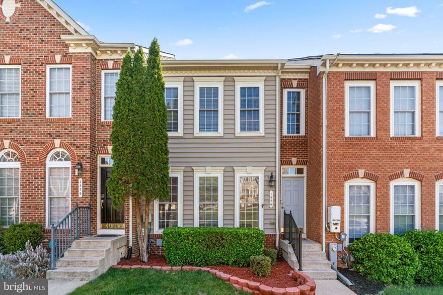 Come see this fabulous 3 bedroom, 3.5 bathroom luxury townhome in the highly sought after Villages of Dorchester!  You'll love it from the moment you come through the door and see that the entire main level has hardwood floors, 9 foot ceilings and spacious bump out on all 3 levels that not all of the neighboring homes have.  The living room is filled with light from the three huge windows and also has crown molding.  Next to the living room is the dining room with chair and crown molding.  The kitchen is complete with granite countertops, kitchen island, 42" cabinets, stainless steel appliances, built-in microwave and double wall ovens.  It's very large and has plenty of space for a kitchen table and so much more.  Take the door out to the deck where you can sit and enjoy your morning coffee while taking in the view of the woods behind the house.  Back inside the main level also has a half bath.  Upstairs is where you will find the three bedrooms and 2 of the full baths.  The primary suite is generously sized and has cathedral ceilings, ceiling fan, oversized walk-in closet, 3 floor-to-ceiling windows and an en-suite that has been renovated (2019) to include a large soaking tub, walk-in shower with custom tilework, double vanity with quartz countertops and a separate water closet.  The other two bedrooms share the guest bath, which has also been updated and both have ceiling fans.  The lower level is fully finished, which provides an entire level of living space to include a large family room area with luxury vinyl plank flooring, gas fireplace for cozy nights at home, walkout level with a door to the backyard, 3rd full bathroom, separate room that could be your home office or a potential 4th bedroom and the laundry/utility room as well.  There are also a lot of storage areas throughout this lovely home.  HVAC 2020! You will also love the HOA amenities:  Club House, Jog/Bike Trails, Community Pool, and Tot-Lot.  All of this and the location can not be beat as you will be minutes from routes 100, 295, and I-95 with easy access to Baltimore, Ft Meade, NSA, Washington DC and Annapolis!  Check out the virtual tour!