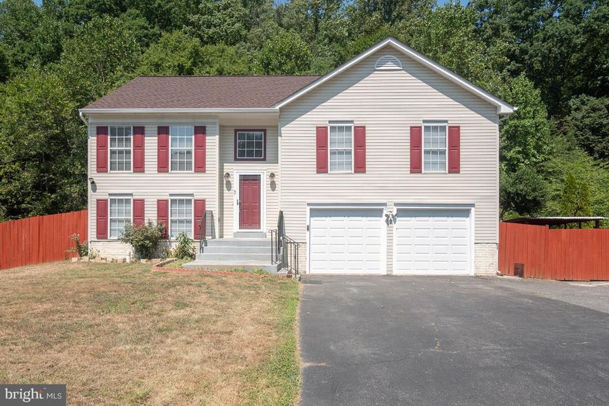 Beautiful house with lots of upgrades! New roof, new shed, new garage doors! This house has a lot to offer. Kitchen with stainless steel appliances, recessed lighting throughout and freshly painted. 2 car garage with bonus carport. Huge backyard for entertainment. Perfectly located! Close to Quantico, restaurants and shopping areas. Great neighborhood. This house is ready to move in. Send us your offer!