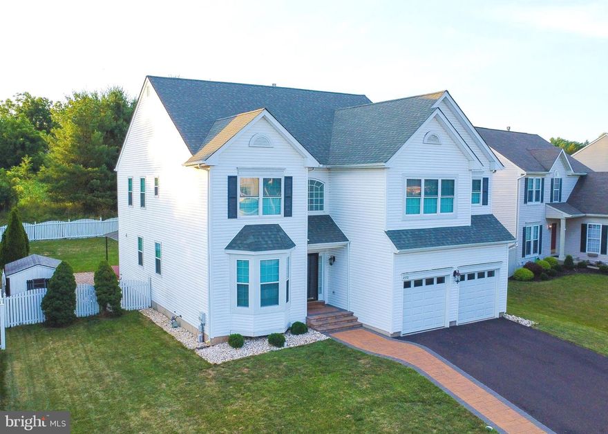 Proudly offered is this Ventresca built, Alexander model home located at the top of Summer Hill. You get it all! Prime locale just minutes from downtown Doylestown, nearby shopping centers, in a great neighborhood, and excellent Central Bucks School District. This includes a nearby walking path to the elementary school.  Featuring one of the most impressive open floor plans in the neighborhood, a fenced in yard, 2 car garage, and finished basement. Also freshly painted interiors, newly installed recessed lighting throughout, and new top down + bottom up energy saving honey comb shades. Walk up the new EP Henry stone walkway as you enter into this 4 bedroom home that has been lovingly upgraded and maintained. Hardwood floors in the foyer open up to the elegant living room with bay window and formal dining room with crown molding and chair rail. Hardwood floors continue to lead you into the kitchen with white cabinets and fridge, stainless steel appliances, granite countertops, and island with built in beverage/wine fridge. The kitchen overlooks the Grand Family room with 20+ ft. high ceiling that boasts a gorgeous wall of windows with remote controlled shades, gas fireplace, hardwood floors, and recessed lighting. Completing the 1st floor is a powder room and convenient laundry room with wash sink. Upstairs you can head to one of the 4 spacious bedrooms including the Master Suite with vaulted ceiling, sitting room, his and her walk-in closets with built in shelving, bathroom with large soaking tub, and extra large shower with seamless glass walls. There are an additional 3 bedrooms, 2 of which have their own walk-in closets. Completing the upstairs is a large hallway bathroom with double sinks and its own large linen closet.  The finished basement offers 4 distinct living spaces including the large Main area, Gym, Office nook, and Theatre room with pocket doors, plus a tucked away temperature-controlled wine cellar.  Let's call it a day and enjoy the evenings on the rear deck overlooking the fenced in yard with garden shed.  New water softener and new water heater.  Last but not least benefit from the nearly new 30 year shingle roof and windows throughout the home. No HOA. Do not miss out on your chance to call this home!!