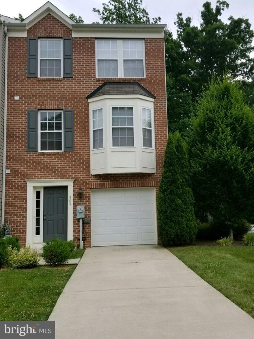 This home is absolutely gorgeous. Complete with beautiful garage level family room that leads to a patio that backs to trees and great scenery. The second level is where you will find a large eat-in kitchen, family room with fireplace and a large deck for entertaining . The 3rd floor has 3 spacious bedrooms. Master suite is equipped with master bath and Jacuzzi jet tub.