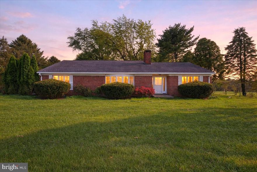 Discover 280 Starr Road in desirable Landenberg, PA — a well-built brick ranch home offering comfortable one-level living on a spacious, approximately 1-acre lot. This classic 1979 residence features approximately 1,944 square feet of living space with 3 bedrooms and 2 bathrooms. The thoughtfully laid-out floor plan includes a bright eat-in kitchen with wood cabinetry, a generous family room highlighted by a striking stone fireplace, a separate living room, and a relaxing screened porch perfect for enjoying the scenic surroundings.  The home boasts hardwood floors in the main living areas, a convenient laundry room, and a primary bedroom with en-suite bath. A full unfinished basement provides excellent expansion potential for additional living space, a home gym, or workshop. Additional highlights include a two-car garage, practical outbuildings including a red barn-style shed, and mature landscaping that frames the property with privacy and charm.  Set on a level, open lot with beautiful views of neighboring fields and mature trees, this solid brick ranch combines timeless curb appeal with room to personalize. Ideally located in scenic Chester County, 280 Starr Road is ready for your updates and offers the perfect blend of space, functionality, and peaceful suburban living.