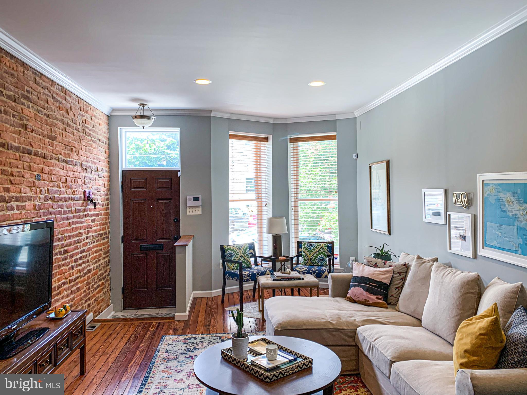 OPEN HOUSE SATURDAY 11 A.M. - 1 P.M. This upgraded row home boasts 3 bedrooms, 2 full baths and 1 half baths. Upgraded features include an open floor plan, wood floors, and granite counter tops. Enjoy fresh air outside on the rear deck and paved patio with privacy fence. Conveniently located close public transportation, Johns Hopkins Hospital, Patterson Park, Canton, Fells Point and downtown Baltimore.