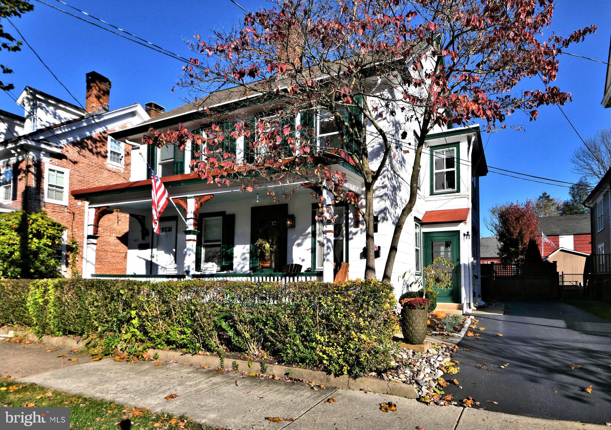 Here is your chance to live in the Heart of Newtown Borough in a large classic Twin home upgraded and modernized for today's homeowners. Features include and a modern kitchen with granite counters, stainless steel appliances, off street parking, a private, fenced in backyard with a bluestone patio just perfect for entertaining. The first floor has a living room, a parlor, a dining room, a powder room and the beautiful kitchen. There are 3 bedrooms on the second level a laundry area and an updated and spacious bathroom. The 3rd floor has a nice sized bedroom or a great office space. Tasteful colors and gorgeous hardwood floors. You will enjoy all that Newtown has to offer with fantastic restaurants and quaint shops all within a few blocks.