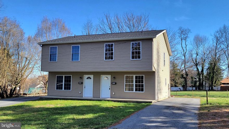 Affordable & Move-In Ready Duplex – Like New Inside & Out!    Enjoy easy living in this beautifully refreshed duplex featuring 3 bedrooms and 1.5 baths. The interior has been freshly painted and updated with brand-new flooring and appliances, giving the home a modern, move-in ready feel.   The main level offers convenient laundry, a spacious layout, and comfortable living areas. Stay comfortable year-round with efficient electric heat and central air.   Step outside to a rear patio—perfect for relaxing or entertaining. The home also includes low-maintenance vinyl siding, off-street parking, and public water and sewer for added convenience.   Ideally located on the edge of town, you’ll appreciate quick access to shopping, dining, and major interstates. A newer roof (2005) adds peace of mind.   Affordable, low-maintenance, and ready for its next owner—don’t miss out! Call today to schedule your showing.