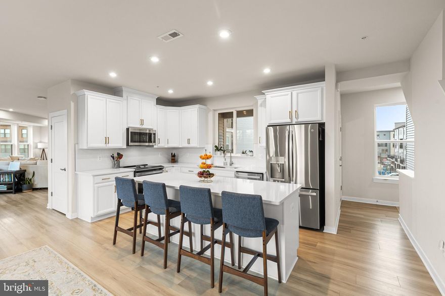 **Stunning Like New Townhome-Style Condo 2800+ sqft in Prime Location! 

Welcome to your dream home! This spacious 2800+ sqft top unit condo offers the perfect blend of luxury and comfort. Featuring 3 bedrooms, 2.5 baths, a full office, and a den, this condo is designed for modern living. Enjoy cooking in the gourmet kitchen equipped with stainless steel appliances and a large island, perfect for entertaining. 

Natural light floods through tons of windows, enhancing the open concept layout adorned with wide plank LVP flooring and plush carpet in the bedrooms. Step outside onto one of your two balconies to savor your morning coffee or unwind after a long day.

Conveniently located within walking distance to local metro stop, shopping and restaurants, this home is just 6 miles from Dulles Airport, 10 miles to Leesburg, and 32 miles to DC—making commuting a breeze! Experience the perfect blend of space, style, and accessibility. Don’t miss out on this like-new property; schedule your private tour today!