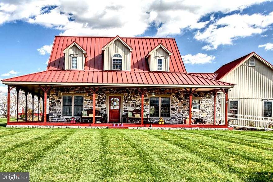 Your own piece of paradise! Beautiful custom built rancher on 3.85 acres w/breathtaking views of the countryside! Enjoy the open layout & lots of natural light in this 3BR/2.5BA home featuring Brazilian Cherry Flrs, vaulted ceilings, gourmet custom kit w/granite counters, flr to ceil stone fp & lg master suite. Landscaped pond w/fountain & gazebo, lg wrap around cov porch & patio + huge 40x60 detached Barn/Garage/Workshop. Handicapped accessible