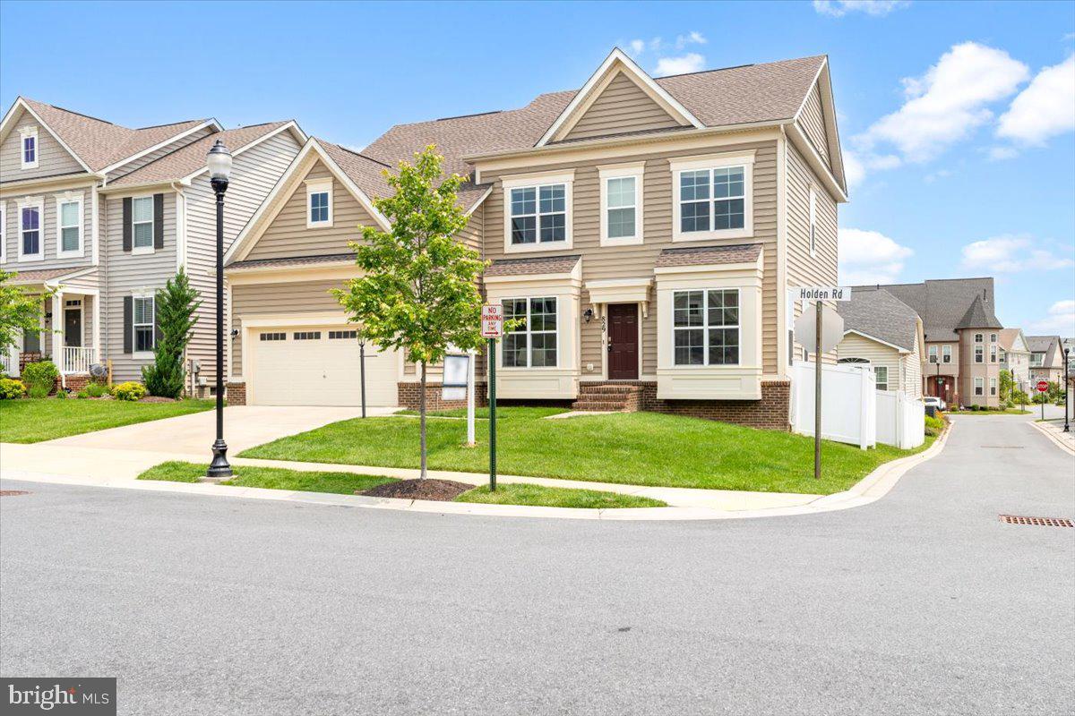 Stunning 5 bedroom home situated on a corner lot in the highly desirable Frederick community of EastChurch. Located just one mile from vibrant Downtown Frederick and Carroll Creek, enjoy a short bike ride or walk to all the shops and restaurants the city has to offer. This 5-bedroom, 4.5-bathroom home inludes a 2-car garage and over 4,300 finished square feet of living space across 3 levels, offers hardwood flooring, a dedicated office space with French doors, formal living/dining room, spacious, bright & open family room with 4 foot bump out, gourmet kitchen with stainless steel appliances, granite counter tops and a large center island with space for additional seating. Upstairs you will find 4 large bedrooms and a loft/flex space. The owners suite has 2 walk-in closets and ensuite bath with a soaking tub, separate shower and double vanity. Just down the hall, another bedroom with an ensuite full bathroom, and 2 more spacious bedrooms including Jack & Jill full bathroom! The fully finished basement includes a 5th bedroom with walk in closet, full bathroom, rec area, storage area, and an additional finished 6th bonus room, with walk-up backyard access! This home sits at the lowest elevation in the community, making the location with its 6 ft privacy fence truly private. The backyard is just waiting for your personal touch which can include a patio, deck or both! This home is built for easy living, entertaining, and everyday enjoyment. Community perks include an outdoor pool & clubhouse with gym, scenic walking trails & green space, playground and community events, sidewalk-lined streets and friendly neighbors. Skip the car! Conveniently located just minutes away from downtown Frederick’s best shopping, dining, entertainment, dog parks, and top rated breweries & distilleries… this home has it all!