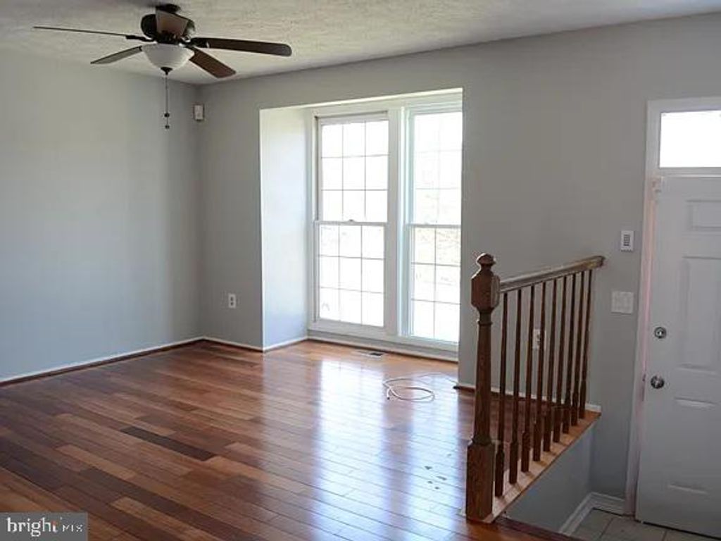 Photo of 49 Rocky Brook Court, WINDSOR MILL, MD 21244 (MLS # MDBC2150064)