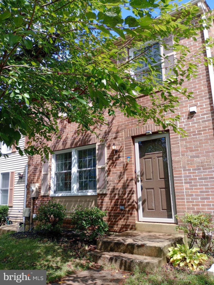 CHARMING BRICK TOWN HOME BOASTS IMPROVEMENTS AND UPDATES THROUGHOUT! NEW HEATING & AC 2022. ALL NEW WINDOWS AND DOORS 2021. WATER HEATER 2015. OPEN LIVING ROOM WITH VINYL PLANK FLOORING, MAIN LEVEL HALF BATHROOM,  SPACIOUS KITCHEN WITH NEW DISHWASHER & REFRIGATOR. DINING AREA SLIDER LEADS TO DECK. UPPER LEVEL WITH ALL BRAND NEW CARPET! PRIMARY BEDROOM WITH SEPARATE VANITY AND PRIVATE SHOWER. LARGE HALL FULL BATHROOM. LOWER LEVEL OFFERS CLUB ROOM WITH SLIDER TO BACKYARD, SEPARATE BONUS ROOM AND 3RD FULL BATHROOM.  FRESHLY PAINTED THROUGHOUT.  MOVE IN AND ENJOY!   COMMUNITY AMENITIES INCLUDE OUTDOOR COMMUNITY POOL,  TENNIS COURT AND PLAYGROUND!