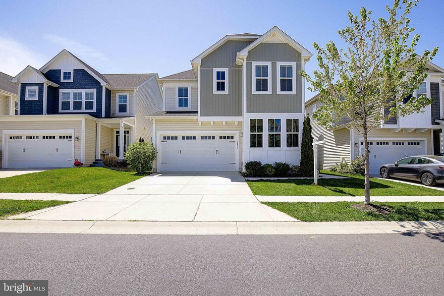 Welcome to this stunning home nestled in the highly sought-after Cascades at Two Rivers community. This beautifully appointed residence offers the perfect blend of luxury, comfort, and convenience.
Step inside to an expansive open-concept layout featuring engineered hardwood flooring throughout the main level and staircase. The gourmet kitchen boasts an oversized island, granite countertops, stainless steel appliances, a gas range with wall oven, microwave, and abundant cabinetry—ideal for both entertaining and everyday living. Escape to the cozy living room wrapped in windows, or gather in the open concept family room featuring a gas fireplace, perfect for relaxing evenings. A spacious main-level office offers the perfect work-from-home setup. Step outside to your private backyard oasis—a  large screened-in porch perfect for outdoor gatherings, professionally designed hardscape ready for a fire pit, low-maintenance turf, and a fully fenced yard for ultimate privacy. Upstairs, you'll find four generous bedrooms & 3 full bathrooms, including a luxurious owner’s suite with tray ceilings, two walk-in closets, and a spa-inspired en-suite bath featuring a freestanding soaking tub, large walk-in shower, and double vanities. The fully finished walkout basement includes a full bath and the potential for a fifth bedroom—perfect for guests or extended family. Conveniently located just half a mile from the new Two Rivers Elementary School, this home offers suburban tranquility with unbeatable access: Wegmans is 10 minutes away, Odenton MARC Station in 15, and Downtown Annapolis or the DC Metro within 20 minutes. Residents of Two Rivers enjoy resort-style amenities, including clubhouses, multiple pools, a fitness center, tennis and sports courts, community gardens, parks, playgrounds, and scenic trails. This is more than a home—it’s a lifestyle. Welcome to Two Rivers.