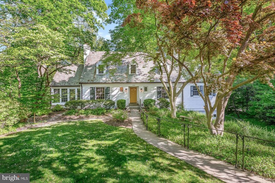 Welcome to 5300 Boxwood Court, a spacious, move-in ready Cape Cod with generous room sizes, located in desirable Westmoreland Hills.  This handsome home is sited on the second largest lot in the neighborhood and provides amazing vistas of mature trees and seasonal reservoir views.  Beautifully and extensively renovated top to bottom starting in 2008 and completed in 2010, nothing has been overlooked.  The main level boasts a welcoming foyer with large coat closet and powder room; expansive living room with fireplace and custom built-ins; spacious dining room with French doors leading to an enormous deck; handsome study with custom built-ins; chef’s kitchen with commercial appliances adjoining a great room reminiscent of Aspen, with a huge fireplace and beamed ceiling and a large sun porch surrounded by greenery.  The second floor boasts 4 large bedrooms and 3 full bathrooms.  The walk-out lower level has 9’6” ceilings and provides a large recreation room with a fireplace, an impressive wine cellar, large bedroom and full bathroom, laundry, storage and more.   The brick exterior, slate roof, wrought iron railings, extensive custom stone work with two-tiered flag-stone patios are just a few of the beautiful features of this gorgeous home.  The piece-de -resistance is a free-flowing heated pool nestled among the trees and a fun sport court for outdoor activities serves as an added bonus.  Rarely does such a lovely home located in such a desirable spot come to market.