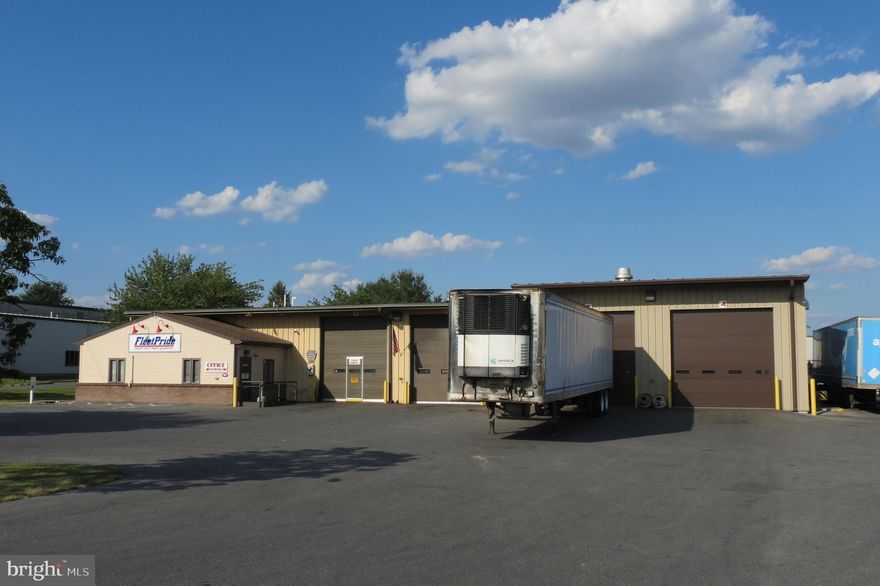 Free-standing truck repair facility with ample on-site parking, including a fenced rear yard area. Comprised of five (5) bays with nine (9) drive-in doors, office area, break room, and a locker room. Property  is being sold subject to a triple-net lease with FleetPride, which currently runs through October, 2028, with one (1) five (5) year renewal option