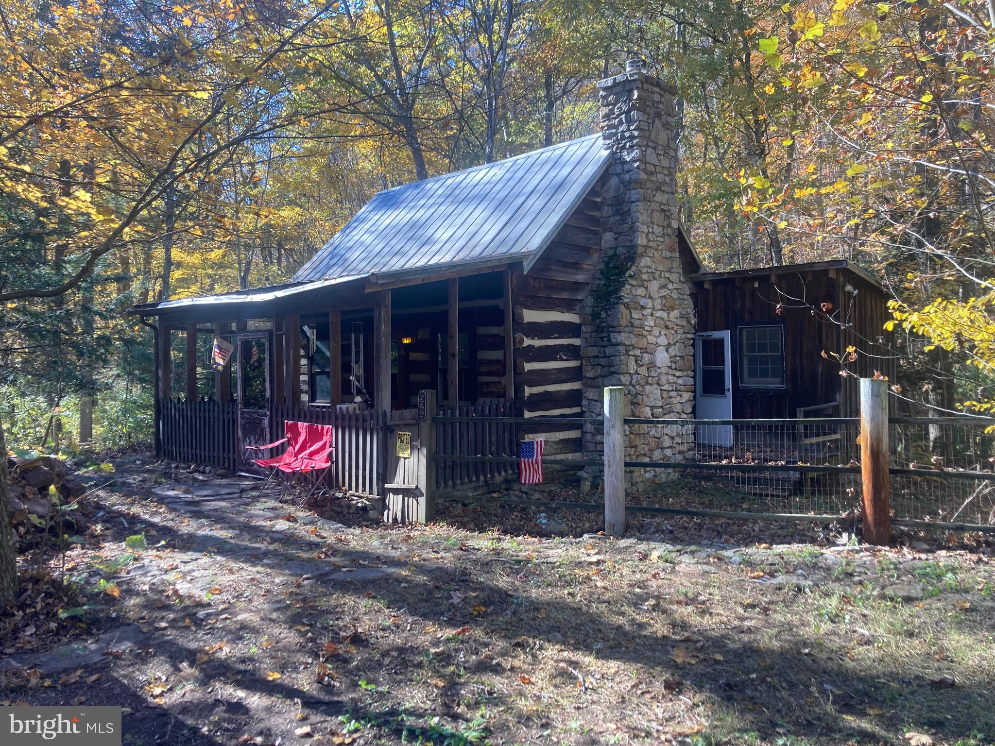 Historic cabin situated in great location between Capon Bridge and Slanesville. State maintained paved road. NO NEIGHBORS IN SIGHT! Stream goes through property . Adjoins the Nature Conservancy. Hunt and fish in your own backyard. There is also a nice barn for an horse or 2 and a shed on the property. Needs a little work. Would make a great getaway or full time residence. Just outside the historic village of North River Mills where there are many cultural activities. This place screams Airbnb ! Come take a look at this great unique place. You won't want to leave!