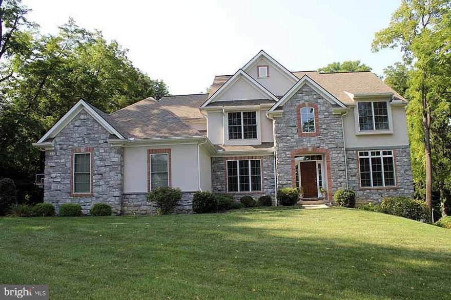 Beautiful 1.09 acre lot in Manheim Township. This spacious home is not in an ordinary development. Enjoy the privacy with oversized patio overlooking the lrg backyard with mature landscaping & stream. Gourmet granite kitchen with island, morning/sunroom & cherry hdwd & high tray ceilings throughout. Master with dual sinks & garden tub in master bath. Walk out finished basement with wet bar & full bath completes this wonderful package!