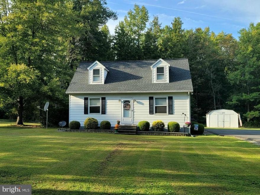 Charming and well maintained Cape Cod on 1.19 acre lot. Main level features a bright living room, spacious kitchen, family room or office,  main level bedroom, and full bath. The kitchen provides ample cabinet space, stainless steel appliances, and access to rear porch. Upstairs you will find two spacious bedrooms and a half bath. Exterior features private yard backing to the woods, large side yard and storage shed. New roof and driveway. Convenient to downtown Chesapeake City and Middletown restaurants and shopping. Bo Manor School district (buyer to verify).